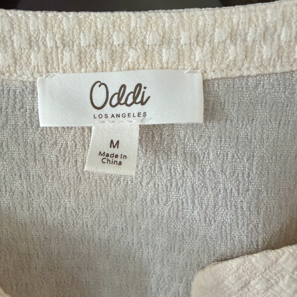 Oddi Los Angeles The Jaxton Cream Embroidered Puff Sleeve Top from Mod Boutique. - Picture 5 of 6